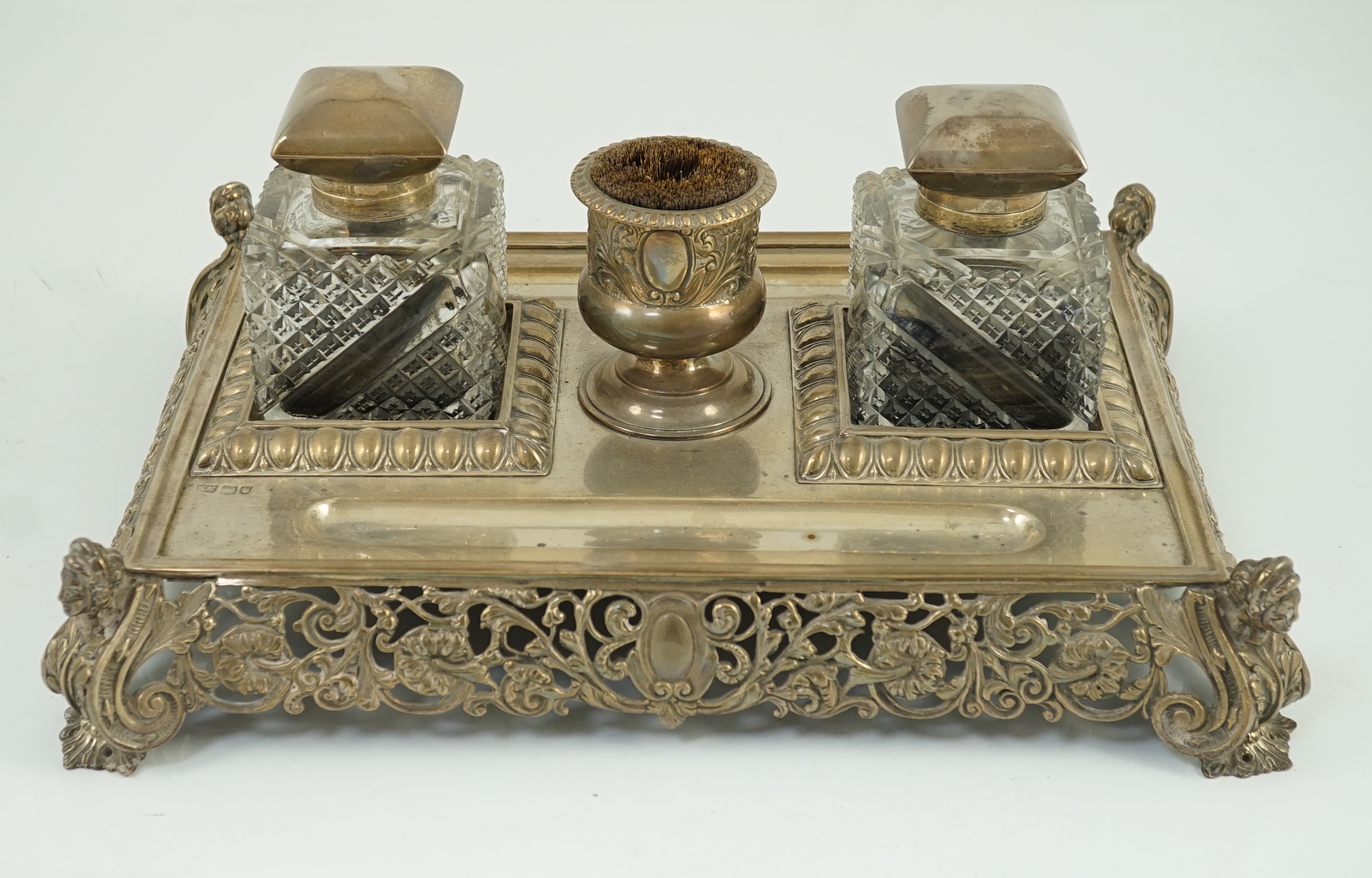 An ornate Edwardian silver rectangular inkstand, by Mappin & Webb